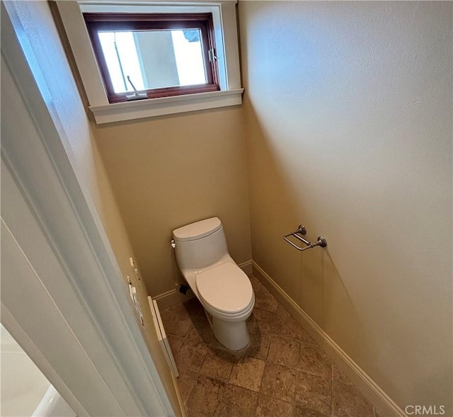304 27th St, Manhattan Beach, CA 90266 - bathroom with toilet and stone finish flooring