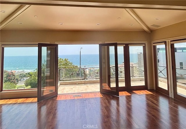 304 27th St, Manhattan Beach, CA 90266 - doorway to outside with a water view, wood finished floors, plenty of natural light, and beam ceiling