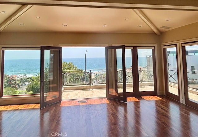 304 27th St, Manhattan Beach, CA 90266 - entryway featuring a water view, wood finished floors, plenty of natural light, beam ceiling, and recessed lighting