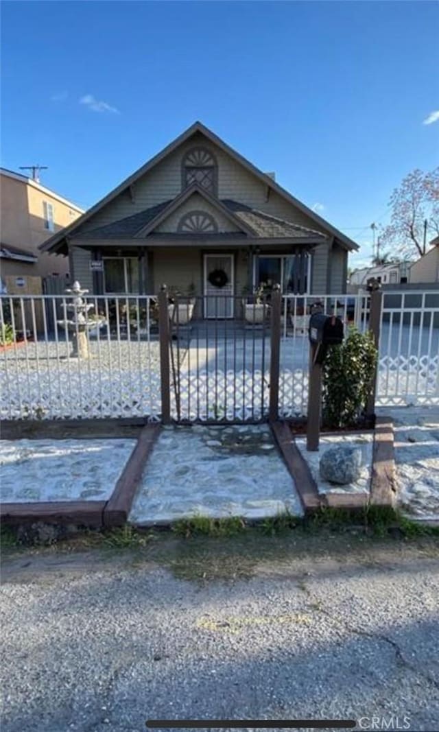 1329 W 3rd St, San Bernardino, CA 92410 - view of front of house featuring a gate and a fenced front yard
