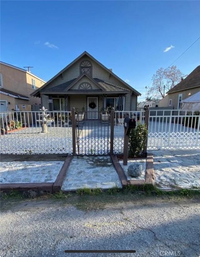 1329 W 3rd St, San Bernardino, CA 92410 - bungalow featuring a gate and a fenced front yard