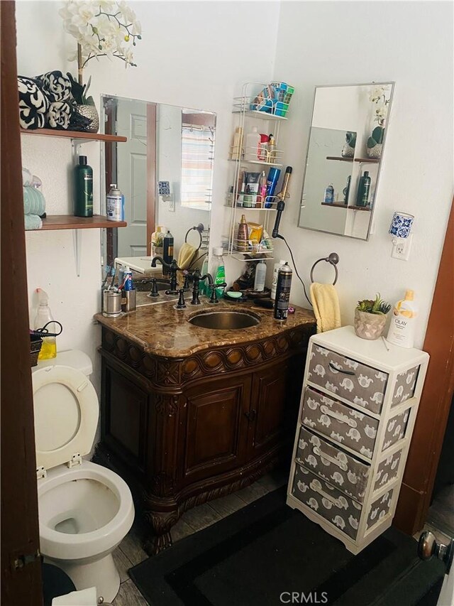 1329 W 3rd St, San Bernardino, CA 92410 - bathroom featuring toilet and vanity