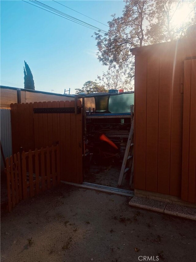 1329 W 3rd St, San Bernardino, CA 92410 - view of gate featuring fence