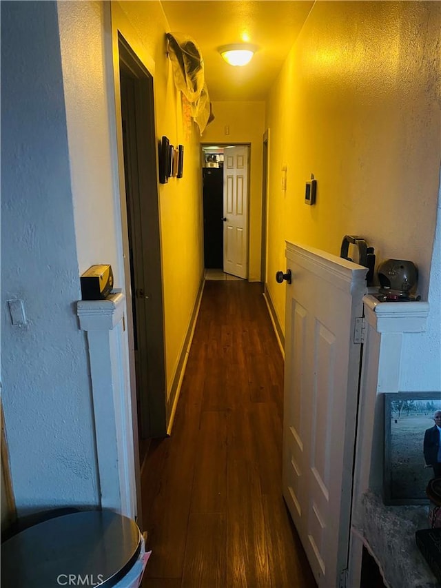 1329 W 3rd St, San Bernardino, CA 92410 - hall with dark wood-type flooring and baseboards