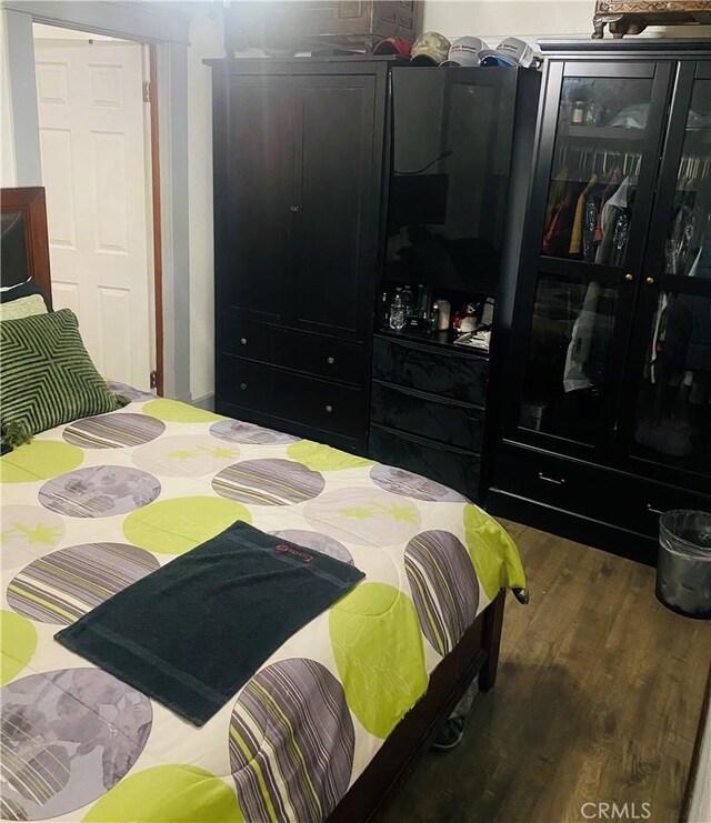 1329 W 3rd St, San Bernardino, CA 92410 - bedroom featuring a closet and wood finished floors