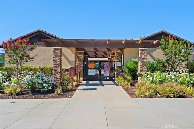 exterior space featuring a carport and concrete driveway