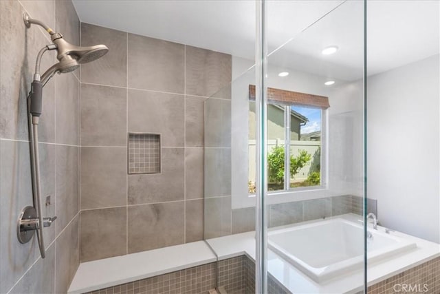 full bathroom featuring recessed lighting, tiled shower, and a garden tub