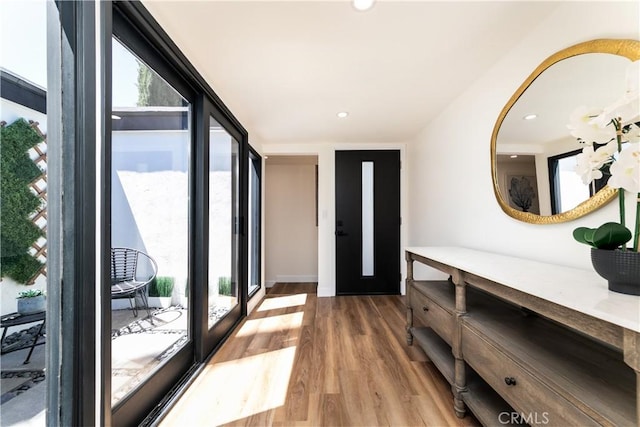 22838 Epsilon St, Woodland Hills, CA 91364 - hall featuring light wood-type flooring and recessed lighting