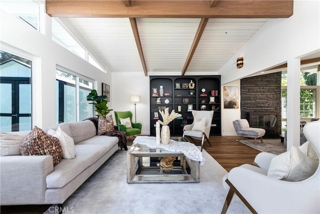 22838 Epsilon St, Woodland Hills, CA 91364 - living room featuring wood finished floors, beam ceiling, french doors, and high vaulted ceiling