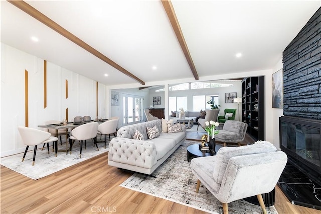 22838 Epsilon St, Woodland Hills, CA 91364 - living room with beamed ceiling, light wood-style flooring, a fireplace, and recessed lighting