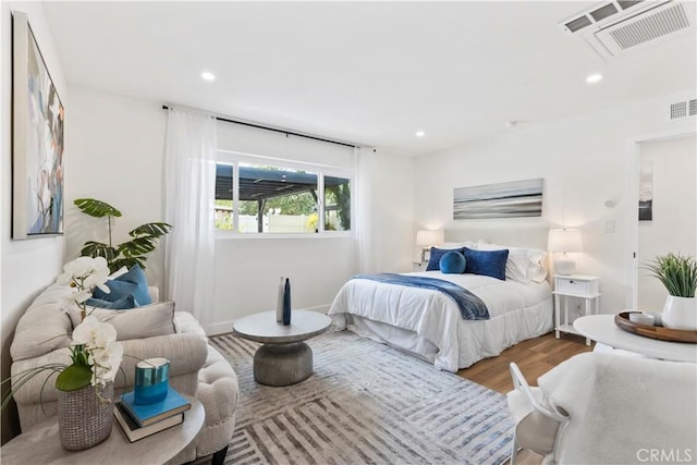 22838 Epsilon St, Woodland Hills, CA 91364 - bedroom with wood finished floors and recessed lighting