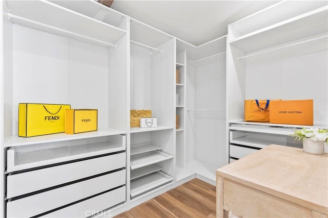 22838 Epsilon St, Woodland Hills, CA 91364 - spacious closet featuring wood finished floors