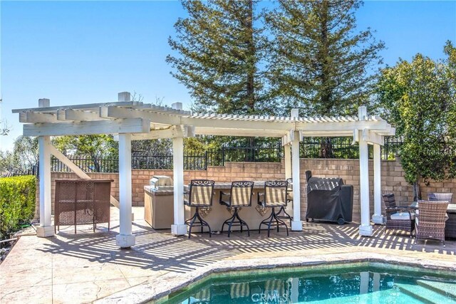 880 E 24th St, Upland, CA 91784 - view of pool featuring a pergola and a patio area