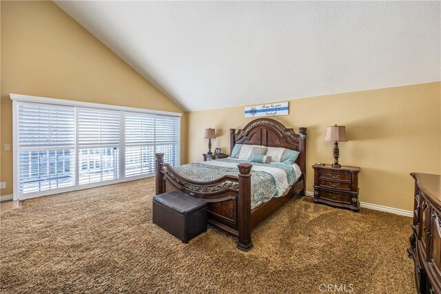 880 E 24th St, Upland, CA 91784 - carpeted bedroom with vaulted ceiling, baseboards, and access to outside
