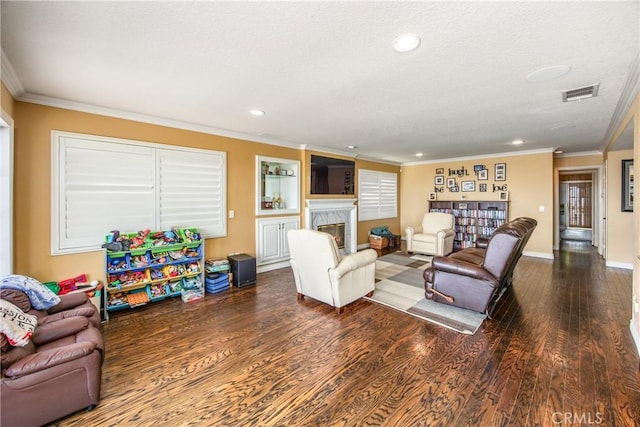 880 E 24th St, Upland, CA 91784 - living room featuring wood finished floors, a high end fireplace, crown molding, recessed lighting, and baseboards