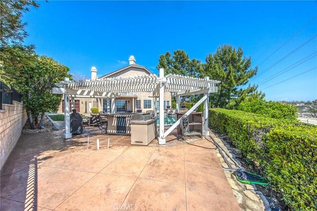 880 E 24th St, Upland, CA 91784 - view of patio / terrace featuring a pergola