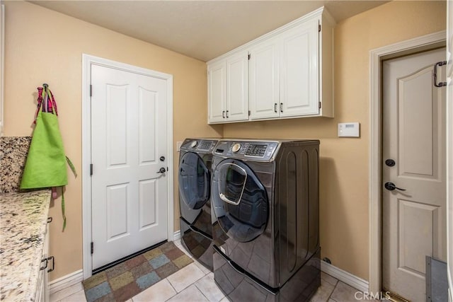 880 E 24th St, Upland, CA 91784 - laundry room with cabinet space, washing machine and dryer, and baseboards