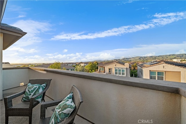 balcony featuring a residential view