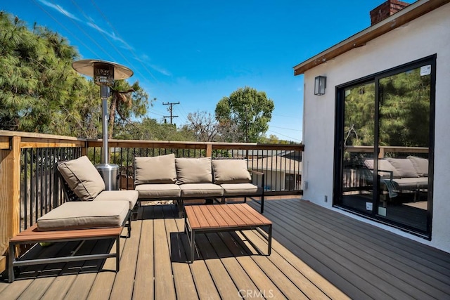 deck with an outdoor living space