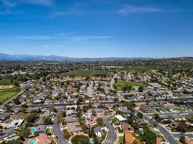 aerial view featuring a mountain view and a residential view
