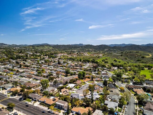 bird's eye view with a residential view and a mountain view