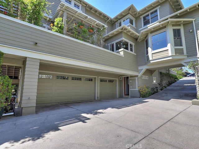exterior space featuring a garage and driveway