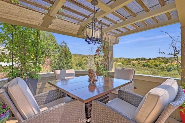view of patio / terrace featuring outdoor dining space and a pergola