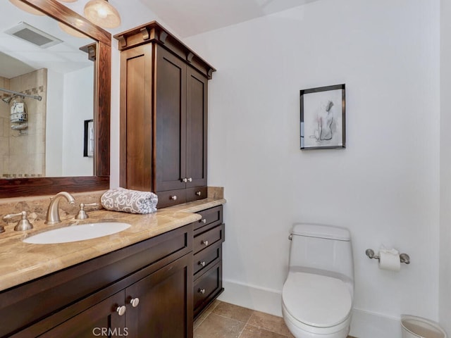 bathroom with visible vents, baseboards, walk in shower, toilet, and vanity
