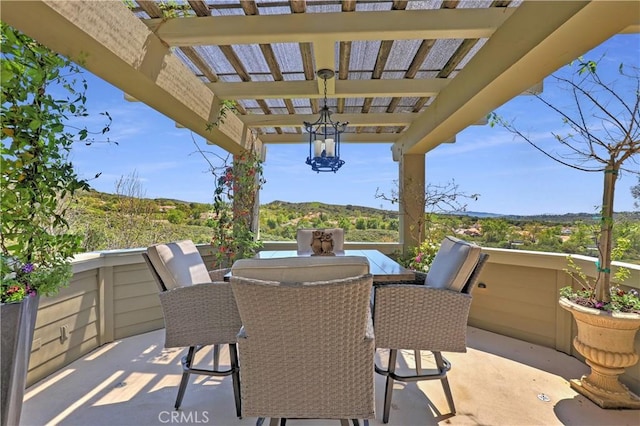 view of patio / terrace featuring outdoor dining space and a pergola
