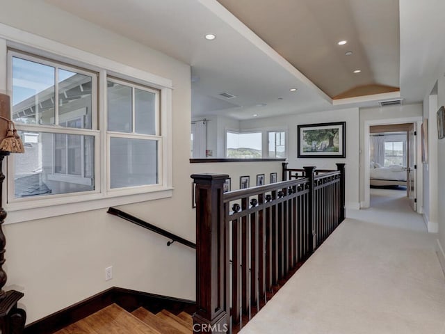 staircase with carpet flooring, baseboards, visible vents, and recessed lighting