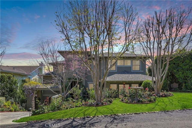 view of front of house with a front lawn
