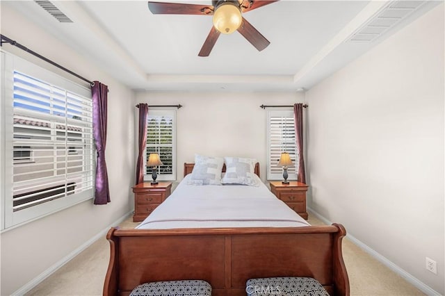 35 Jonquil, Irvine, CA 92618 - bedroom featuring light colored carpet, a raised ceiling, and baseboards