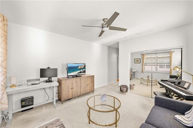 35 Jonquil, Irvine, CA 92618 - living area featuring ceiling fan, light colored carpet, and a desk