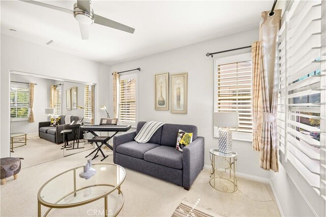 35 Jonquil, Irvine, CA 92618 - living area with carpet, a ceiling fan, and baseboards