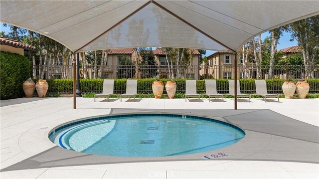 35 Jonquil, Irvine, CA 92618 - view of pool featuring a patio, a swimming pool, and fence