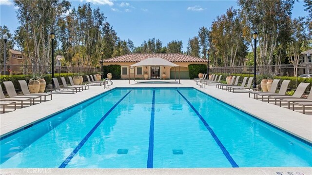35 Jonquil, Irvine, CA 92618 - community pool featuring a patio area and fence