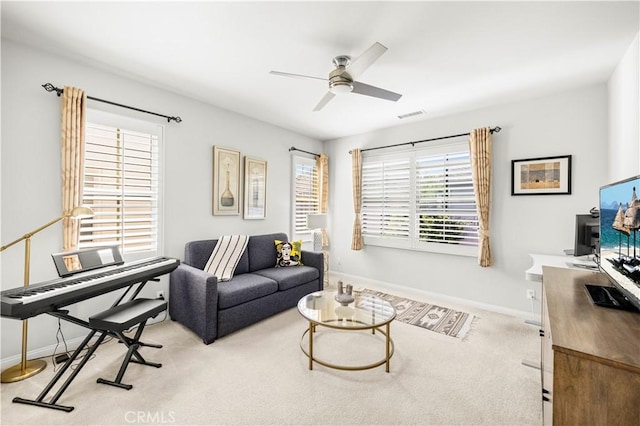 35 Jonquil, Irvine, CA 92618 - living room with ceiling fan, baseboards, and carpet flooring