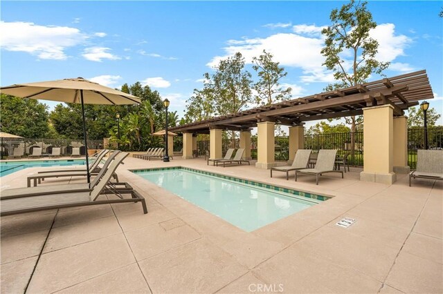 35 Jonquil, Irvine, CA 92618 - community pool with a pergola, a patio area, and fence