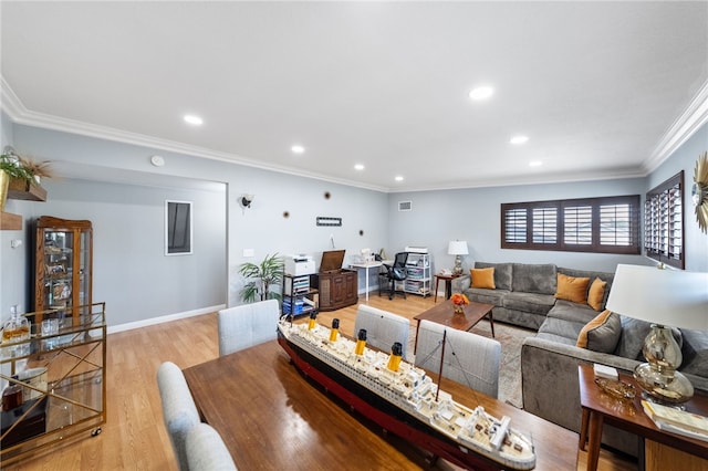 living area with recessed lighting, light wood-style floors, visible vents, and ornamental molding