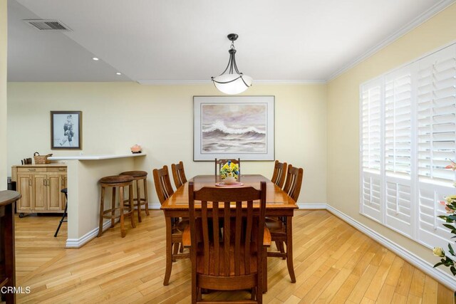 28210 Village 28, Camarillo, CA 93012 - dining room featuring baseboards, ornamental molding, visible vents, and light wood-type flooring