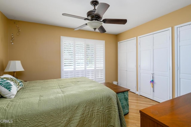 28210 Village 28, Camarillo, CA 93012 - bedroom with light wood finished floors, a ceiling fan, and multiple closets