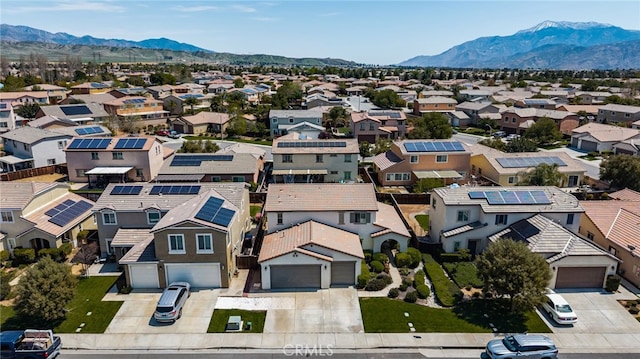 birds eye view of property featuring a mountain view and a residential view