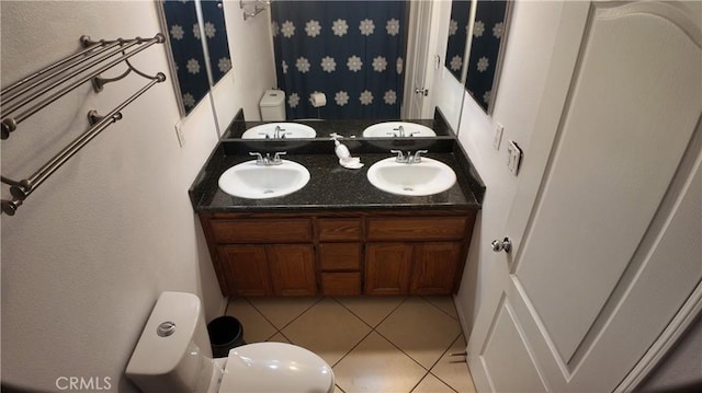 464 W E St, Colton, CA 92324 - full bath featuring toilet, double vanity, and tile patterned floors