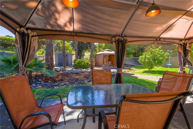 41768 Via El Greco, Temecula, CA 92592 - fenced backyard featuring a gazebo, outdoor dining space, and a patio area