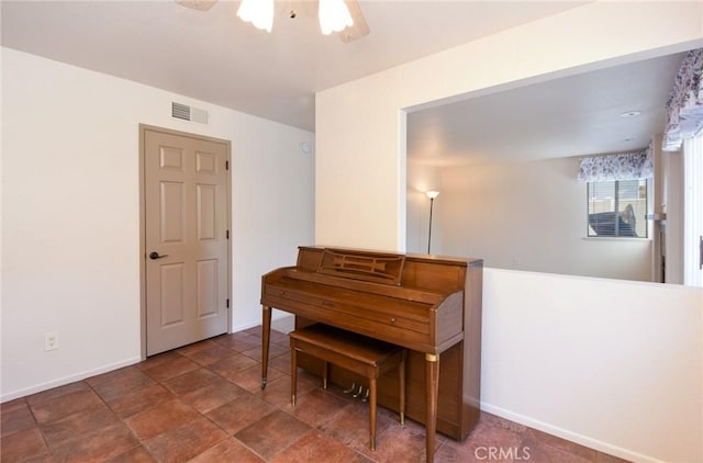 41768 Via El Greco, Temecula, CA 92592 - living area featuring ceiling fan, baseboards, and stone finish flooring