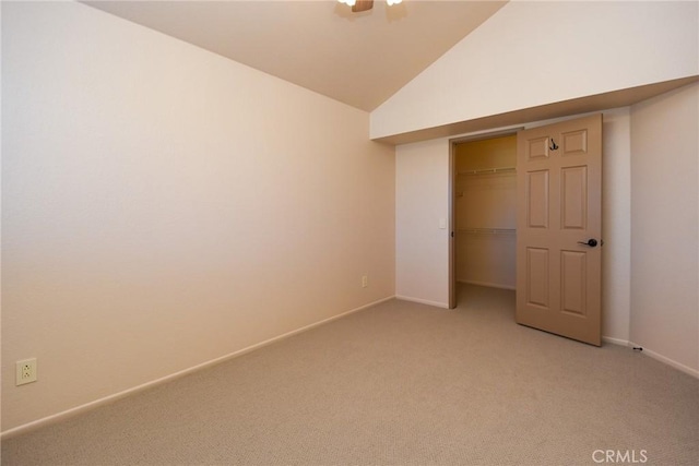 41768 Via El Greco, Temecula, CA 92592 - unfurnished bedroom with light carpet, lofted ceiling, a closet, and baseboards