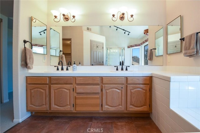 41768 Via El Greco, Temecula, CA 92592 - bathroom with double vanity, a shower stall, a tub, and rail lighting