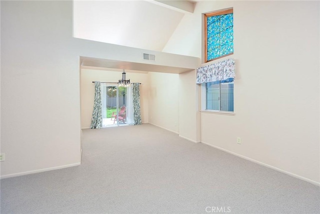 41768 Via El Greco, Temecula, CA 92592 - empty room featuring a chandelier, carpet, baseboards, beamed ceiling, and high vaulted ceiling