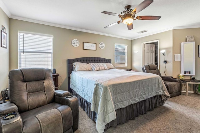 carpeted bedroom with a ceiling fan, crown molding, multiple windows, and visible vents