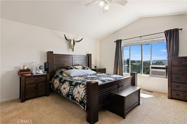 bedroom featuring baseboards, light colored carpet, vaulted ceiling, and ceiling fan